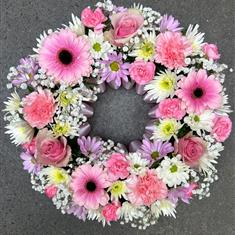 Open wreath in pinks and creams
